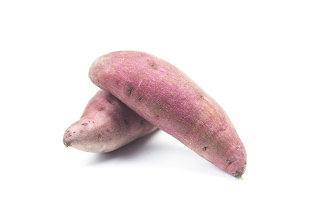Fresh purple potato on white backgroundの写真素材