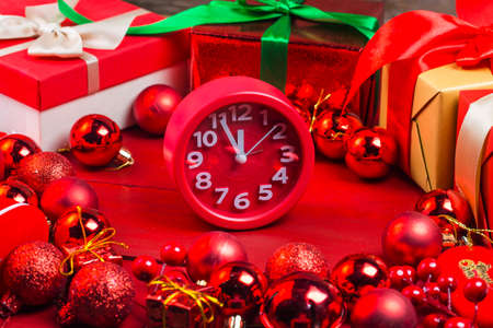 Christmas background with a red ornament, gift box.の写真素材