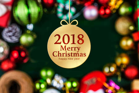 Christmas background with decorations and gift boxes on wooden boardの写真素材