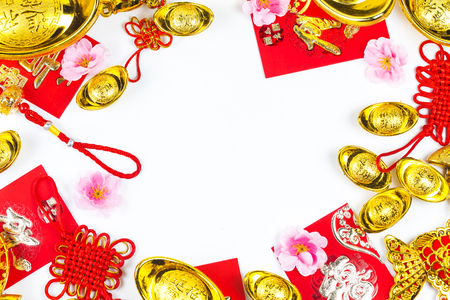 Chinese new year festival decorations, ang pow or red packet and gold ingots. Chinese characters means luck,wealth and prosperity.の写真素材