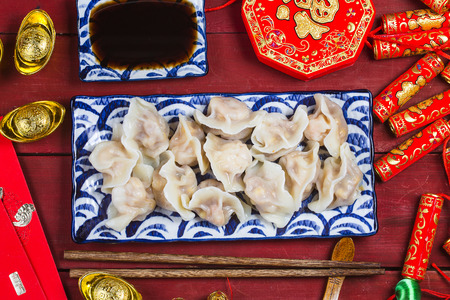 Chinese Jiaozi new year food, spring festival food on traditional spring festival Spring festival atmosphere and dumplingsの写真素材