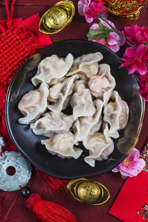 Chinese Jiaozi new year food, spring festival food on traditional spring festival Spring festival atmosphere and dumplingsの写真素材