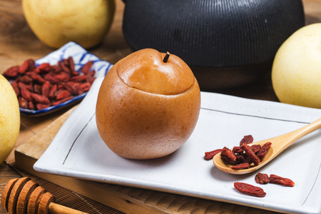 stewed sweet snow pear with red date and wolfberryの写真素材