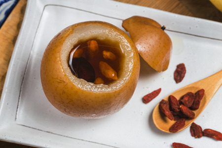 stewed sweet snow pear with red date and wolfberryの写真素材