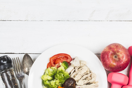 Boiled chicken breasts and vegetables with sports and diet concepts.の写真素材