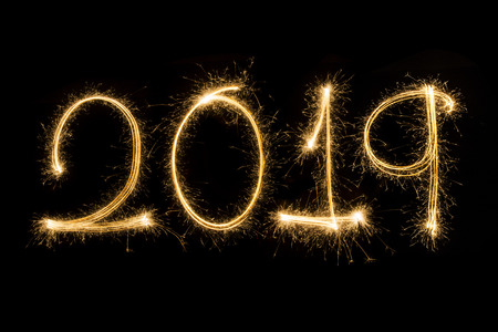 Happy new year 2019  written with Sparkle fireworkの写真素材