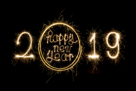 Happy new year 2019  written with Sparkle fireworkの写真素材
