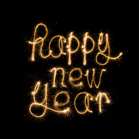 Happy new year   written with Sparkle fireworkの写真素材