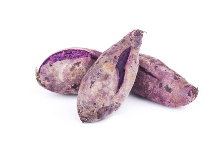 Purple Sweet Potatoes on White backgroundの写真素材