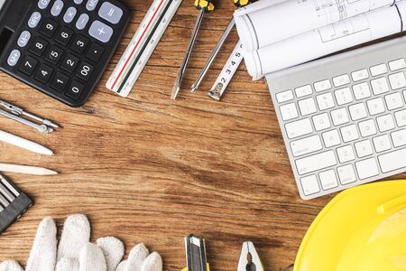 Construction tools on wooden tableの写真素材