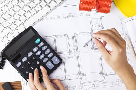 Architect drawing house plan