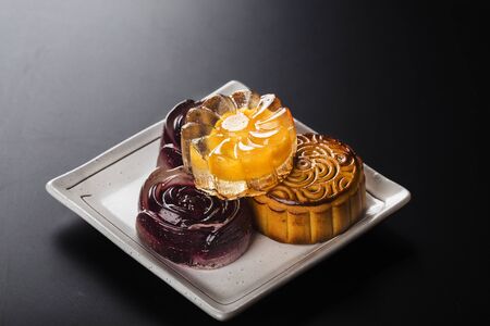 Traditional mooncakes on white plate