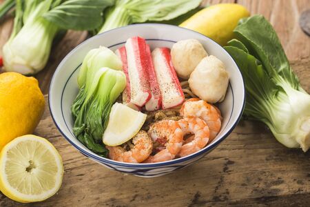 a bowl of hearty seafood noodles