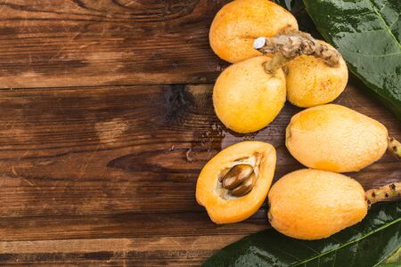 loquat on a wooden backgroundの写真素材