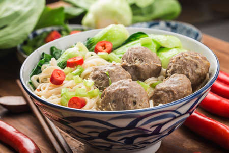 Chinese Foodï¼Meatballs served with noodles, の写真素材