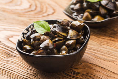 A plate of fresh Corbicula flumineaの写真素材