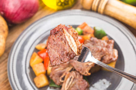 A plate of fresh fried beef ribsの写真素材