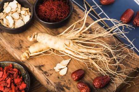 Fresh ginseng and dry slicesの写真素材