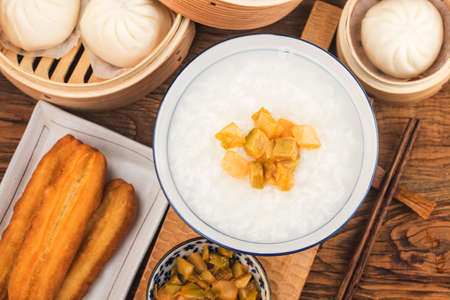 Chinese porridge breakfast set, fried dough sticks, white porridge,の写真素材