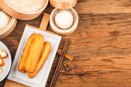 Chinese porridge breakfast set, fried dough sticks, white porridge,の写真素材