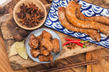 Delicious spiced duck neck on a plateの写真素材