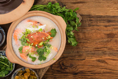 Chinese cuisine:a casserole seafood porridge.seafood porridgeの写真素材