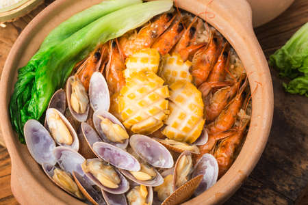Cantonese style seafood rice potの写真素材