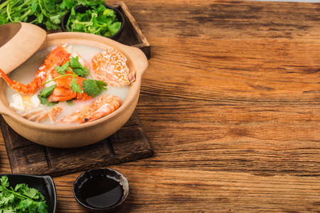 Lobster Seafood congee in a casseroleの写真素材