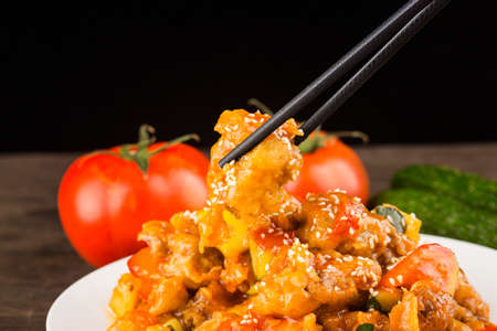 Chinese cuisine- sour and sweet spare rib with pineapple and Cucumberの写真素材