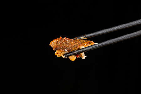 Chinese Cuisine: a plate of spicy roast fishの写真素材