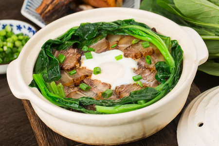 Cantonese style cooking of claypot rice with waxed meatsの写真素材
