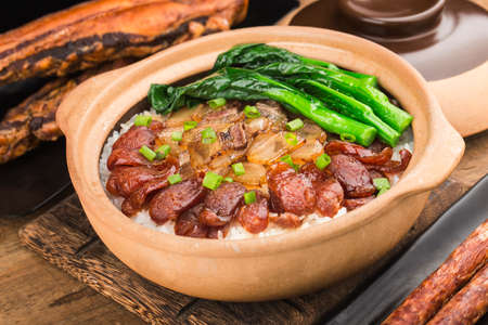 Cantonese style cooking of claypot rice with waxed meatsの写真素材