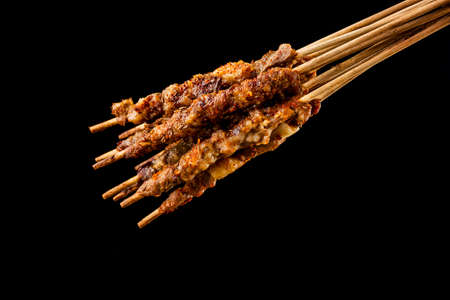 Delicious kebabs, skewers shashlik kebab with red sauce,