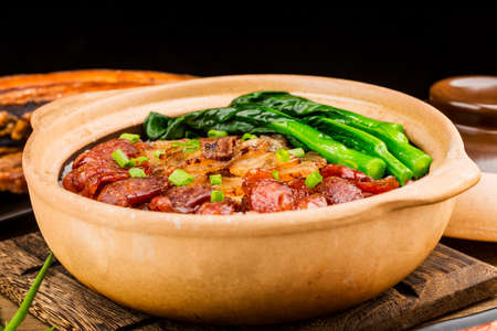Cantonese style cooking of claypot rice with waxed meatsの写真素材