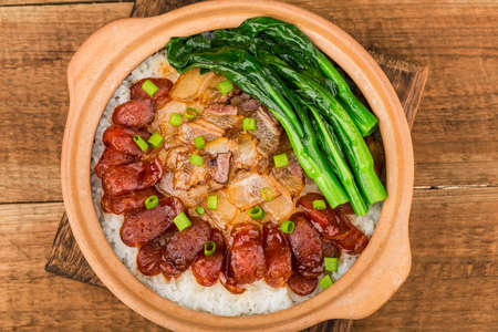 Cantonese style cooking of claypot rice with waxed meatsの写真素材