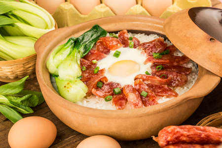 Cantonese style cooking of claypot rice with waxed meatsの写真素材