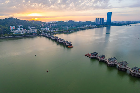Aerial view of Hangzhou West Lake at sunset.