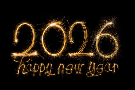 Happy new year 2026 written with Sparkle firework isolated on black background
