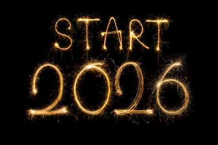 Happy new year 2026 written with Sparkle firework isolated on black background