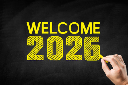 Welcome 2023 text on blackboard, new year greeting card conceptの写真素材