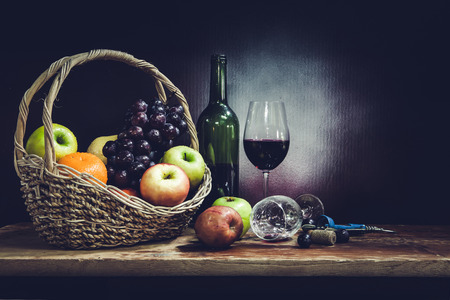 Grape wine in glass with fruit of various kinds.の写真素材