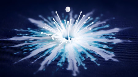 A dynamic blue and white liquid splash frozen in motion creates a starburst effect on dark...