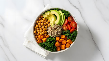 showing overhead view of a healthy buddha bowl with avocado chickpeas sweet potato and...の写真素材