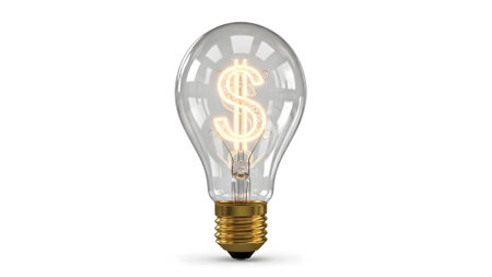 Light showing glowing dollar sign filament inside a clear glass light bulb with golden base....の写真素材