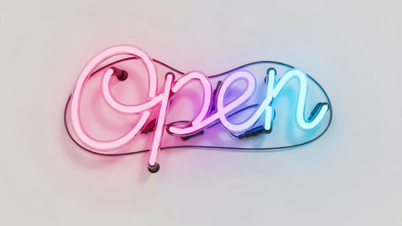 A neon sign spelling "Open" a pink to blue gradient glow on a light gray surface....の写真素材