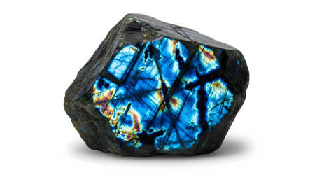 A raw labradorite stone striking blue and yellow iridescent flashes across its surface....