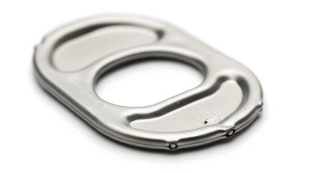 A detailed close-up studio shot of a single silver aluminum pull tab from a beverage can,...