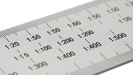 showing silver metal ruler with black measurement markings and scale ratios for...
