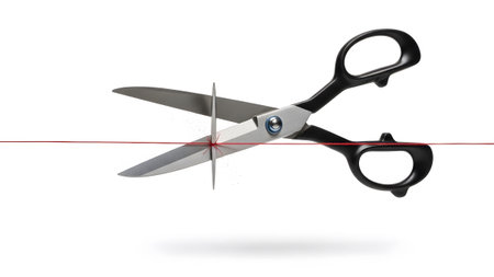 A pair of black-handled scissors with sharp steel blades precisely cutting a thin red string,...