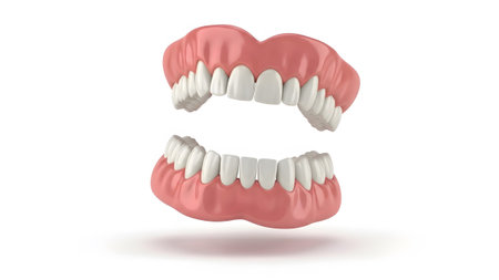 Full showing full set of pink and white dentures floating against a white background.